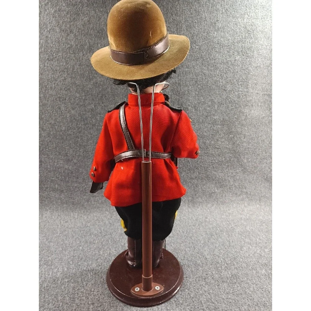 RCMP Country Canadian Mountie Porcelain Doll With Wood Based Stand